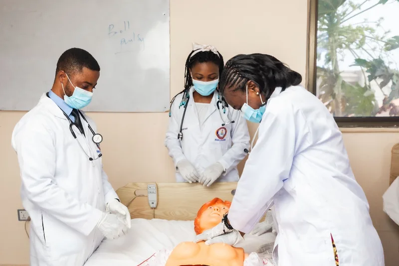 Students practicing CPR in simulation lab