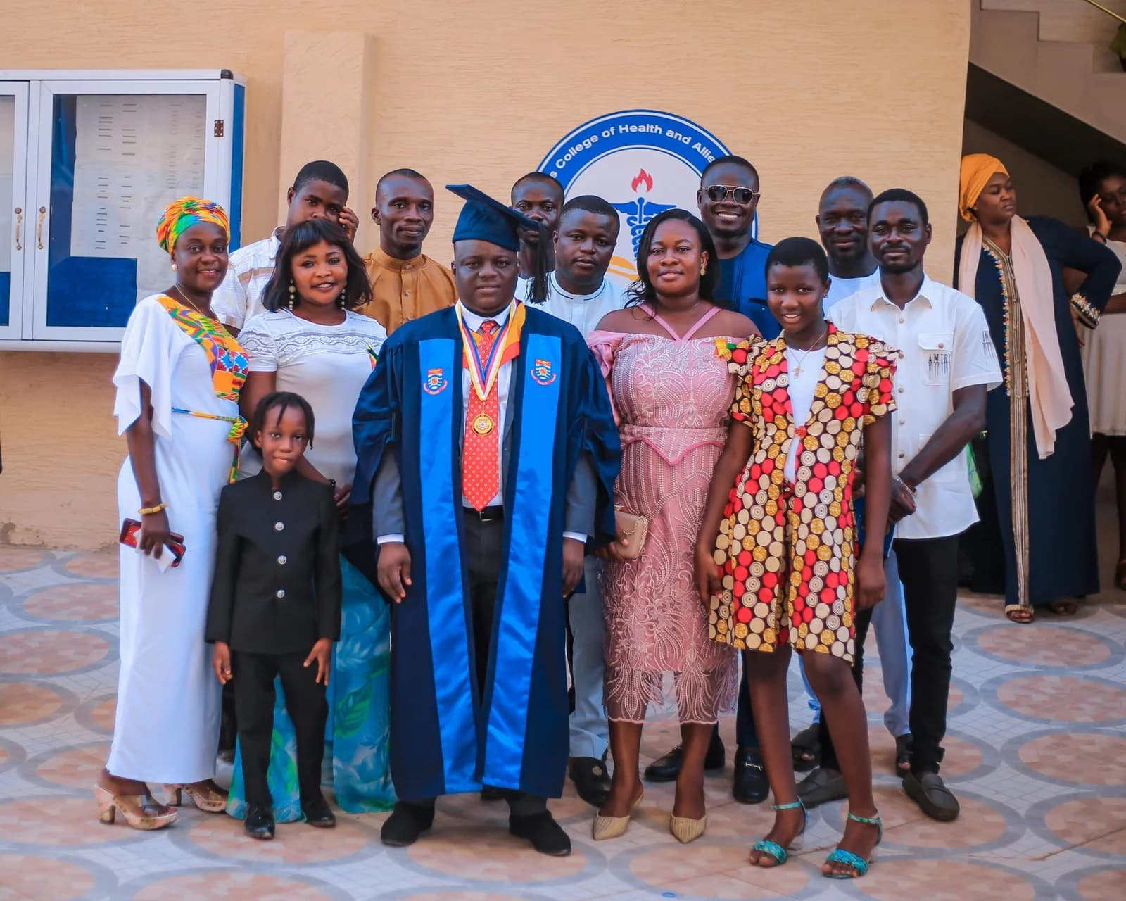 Graduate celebrating with family - investing in education pays off
