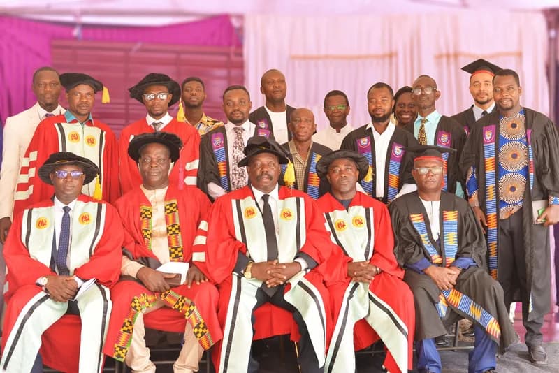 Faculty and staff celebrating with graduates